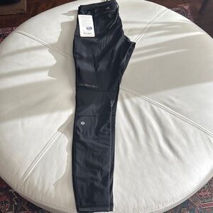 Lululemon Black paneled warmth, tight Leggings